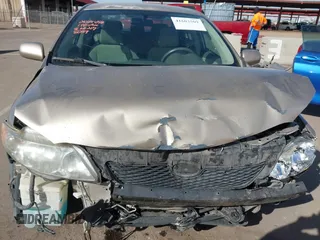 2010 Toyota Corolla with VIN 1NXBU4EE7AZ258059, listed as a IAAI auction lot 41603509 with 183,645 mi miles and . Bid and sale history available at DreamBid. Image 6.