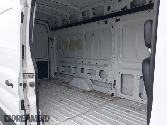 2022 Ford Transit Cargo with VIN 1FTBR3U85NKA64272, listed as a IAAI auction lot 42427708 with 62,043 mi miles and . Bid and sale history available at DreamBid. Image 8.