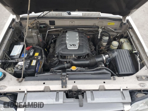 2000 Isuzu Trooper S with VIN JACDJ58X9Y7J18322, listed as a Copart auction lot 42444695 with 149,799 mi miles and Salvage title. Bid and sale history available at DreamBid. Image 12.