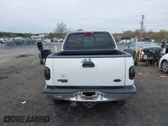 2003 Ford F-150 XLT with VIN 1FTRW08L43KA64328, listed as a IAAI auction lot 41932751 with 275,213 mi miles. Bid and sale history available at carsss.com. Image 16.