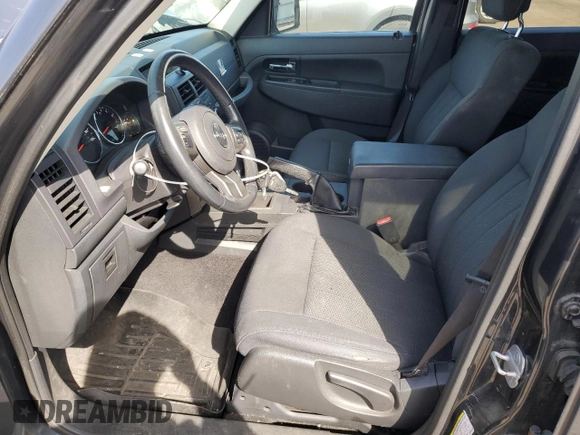 2011 Jeep Liberty Sport 70th Anniversary with VIN 1J4PN2GK9BW593046, listed as a Copart auction lot 51609565 with 142,207 mi miles and Clean Title. Bid and sale history available at DreamBid. Image 7.