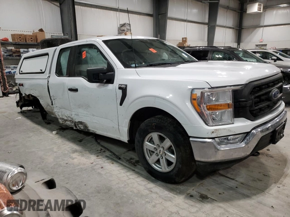 2022 Ford F-150 XL with VIN 1FTFX1E55NKD39753, listed as a Copart auction lot 87063394 with 50,191 mi miles and Salvage title. Bid and sale history available at DreamBid. Image 4.