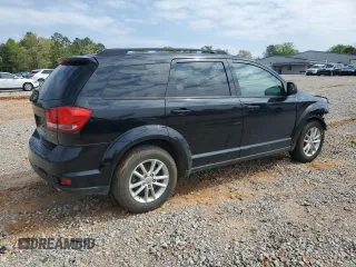 2014 Dodge Journey SXT z VIN 3C4PDDBG2ET242867, wystawiony jako Copart lot #51166995 z przebiegiem 208 568 mil mil oraz Szkoda całkowita • Salvage title. Historia ofert i sprzedaży dostępna na DreamBid. Obrazek 3.