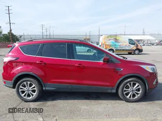 2017 Ford Escape SE with VIN 1FMCU0GD4HUC27041, listed as a IAAI auction lot 42127328 with 107,860 mi miles. Bid and sale history available at carsss.com. Image 13.