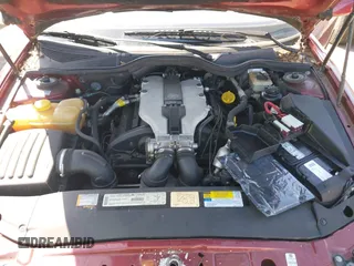 2001 Cadillac Catera z VIN W06VR54R01R003061, wystawiony jako IAAI lot #41989882 z przebiegiem 77 248 mil mil oraz . Historia ofert i sprzedaży dostępna na DreamBid. Obrazek 10.