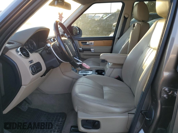 2014 Land Rover LR4 HSE with VIN SALAG2V65EA702088, listed as a Copart auction lot 67165154 with 106,543 mi miles and Salvage Title. Bid and sale history available at DreamBid. Image 7.