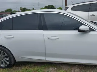 2020 Cadillac CT5 Luxury z VIN 1G6DM5RK3L0146892, wystawiony jako IAAI lot #41928395 z przebiegiem 65 849 mil mil oraz . Historia ofert i sprzedaży dostępna na DreamBid. Obrazek 13.