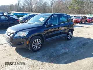2011 Volkswagen Tiguan SE with VIN WVGBV7AX1BW502770, listed as a IAAI auction lot 41739698 with 160,556 mi miles and . Bid and sale history available at DreamBid. Image 2.