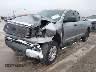 2012 Toyota Tundra z VIN 5TFRY5F18CX121917, wystawiony jako IAAI lot #41475681 z przebiegiem 166 507 mil mil oraz . Historia ofert i sprzedaży dostępna na DreamBid. Obrazek 18.