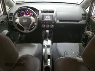 2007 Honda Fit with VIN JHMGD38437S002477, listed as a Copart auction lot 72065034 with 59,192 mi miles and Salvage Title. Bid and sale history available at carsss.com. Image 8.