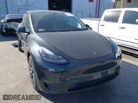 2025 Tesla Model Y Long Range with VIN 7SAYGDED2SF228414, listed as a IAAI auction lot 41706470 with 11,319 mi miles and . Bid and sale history available at DreamBid. Image 1.