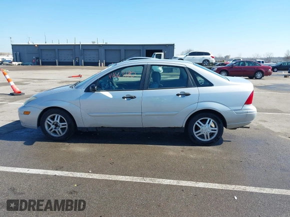 2004 Ford Focus SE with VIN 1FAFP34394W120884, listed as a IAAI auction lot 41663180 with 213,972 mi miles and . Bid and sale history available at DreamBid. Image 14.