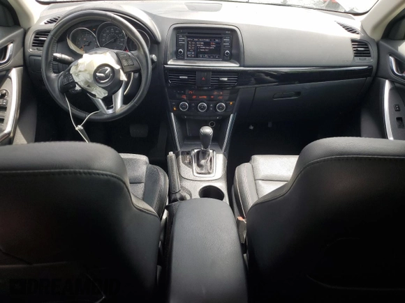 2014 Mazda CX-5 Grand Touring with VIN JM3KE4DY9E0416967, listed as a Copart auction lot 54215285 with 77,296 mi miles and Salvage Title. Bid and sale history available at DreamBid. Image 8.