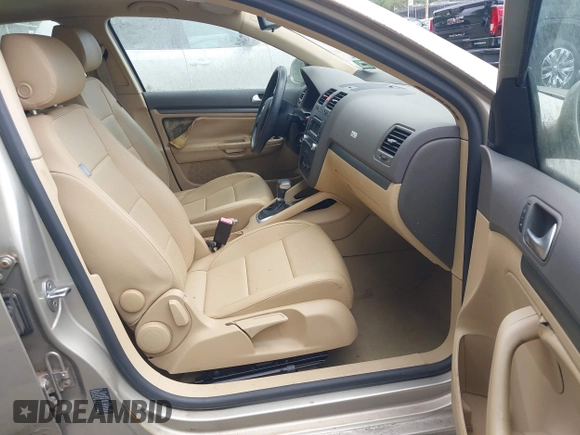 2006 Volkswagen Jetta 2.5L z VIN 3VWSF71K76M750076, wystawiony jako IAAI lot #42769137 z przebiegiem 99 114 mil mil oraz . Historia ofert i sprzedaży dostępna na DreamBid. Obrazek 5.
