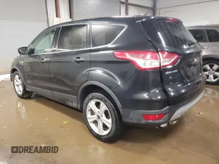 2015 Ford Escape SE with VIN 1FMCU0GX4FUC57258, listed as a Copart auction lot 51085685 with 216,724 mi miles and Salvage Title. Bid and sale history available at DreamBid. Image 2.