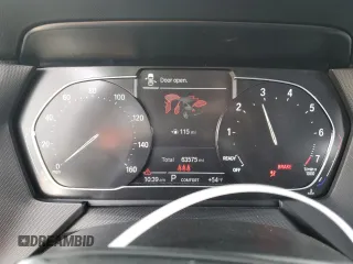 2021 BMW 2 Series 228i xDrive with VIN WBA73AK00M7G52266, listed as a Copart auction lot 87717915 with 63,575 mi miles and Salvage Title. Bid and sale history available at DreamBid. Image 9.