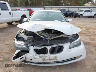 2008 BMW 5 Series 528i with VIN WBANU53528CT03304, listed as a IAAI auction lot 41300506 with 150,570 mi miles and . Bid and sale history available at carsss.com. Image 6.