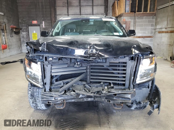 2018 Chevrolet Tahoe LT with VIN 1GNSKBKC7JR361008, listed as a Copart auction lot 55244355 with 76,850 mi miles and Salvage title. Bid and sale history available at DreamBid. Image 5.