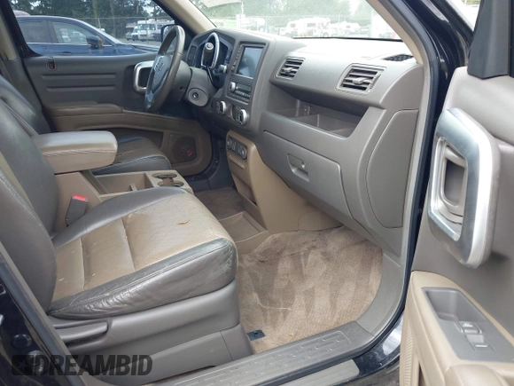 2006 Honda Ridgeline RTL with VIN 2HJYK16526H517466, listed as a IAAI auction lot 42737202 with 184,856 mi miles and . Bid and sale history available at DreamBid. Image 5.