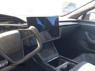 2022 Tesla Model S with VIN 5YJSA1E52NF476906, listed as a IAAI auction lot 41320074 with Not Provided miles and . Bid and sale history available at DreamBid. Image 17.