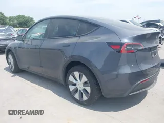 2023 Tesla Model Y Long Range z VIN 7SAYGDEE6PA169168, wystawiony jako IAAI lot #42050428 z przebiegiem 26 731 mil mil oraz . Historia ofert i sprzedaży dostępna na DreamBid. Obrazek 3.