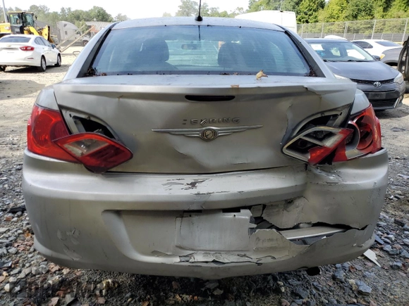2010 Chrysler Sebring Touring with VIN 1C3CC4FBXAN191004, listed as a Copart auction lot 70193354 with 0 mi miles and Salvage Title. Bid and sale history available at carsss.com. Image 6.