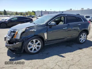 2014 Cadillac SRX Performance Collection z VIN 3GYFNCE36ES687267, wystawiony jako Copart lot #58242255 z przebiegiem 167 577 mil mil oraz Szkoda całkowita • Salvage title. Historia ofert i sprzedaży dostępna na DreamBid. Obrazek 1.