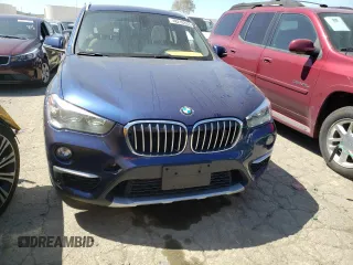2018 BMW X1 sDrive28i with VIN WBXHU7C33J5L06428, listed as a Copart auction lot 48210333 with 33,965 mi miles. Bid and sale history available at carsss.com. Image 5.