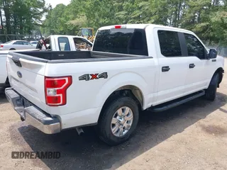 2018 Ford F-150 XL with VIN 1FTEW1EB4JFB72728, listed as a IAAI auction lot 39974264 with 185,958 mi miles and . Bid and sale history available at DreamBid. Image 4.