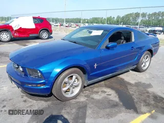 2006 Ford Mustang Standard with VIN 1ZVFT80N565167331, listed as a IAAI auction lot 42162547 with 113,035 mi miles. Bid and sale history available at carsss.com. Image 2.