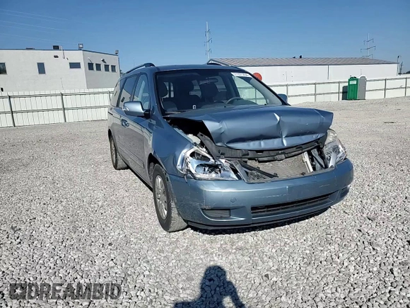 2012 Kia Sedona LX with VIN KNDMG4C70C6447748, listed as a Copart auction lot 71377294 with 146,057 mi miles and Salvage Title. Bid and sale history available at carsss.com. Image 11.