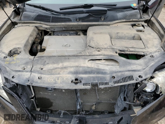 2012 Lexus RX 350 z VIN JTJBK1BA5C2445015, wystawiony jako Copart lot #58238695 z przebiegiem 249 949 mil mil oraz Szkoda całkowita • Salvage title. Historia ofert i sprzedaży dostępna na DreamBid. Obrazek 12.