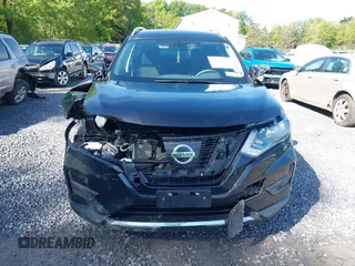 2017 Nissan Rogue SL with VIN 5N1AT2MV8HC897393, listed as a IAAI auction lot 42331237 with 61,155 mi miles and . Bid and sale history available at DreamBid. Image 6.