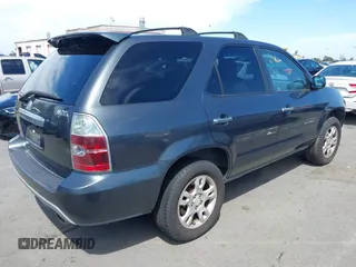 2004 Acura MDX Touring Pkg w/Navigation with VIN 2HNYD18834H517618, listed as a IAAI auction lot 42003807 with 186,555 mi miles. Bid and sale history available at carsss.com. Image 4.