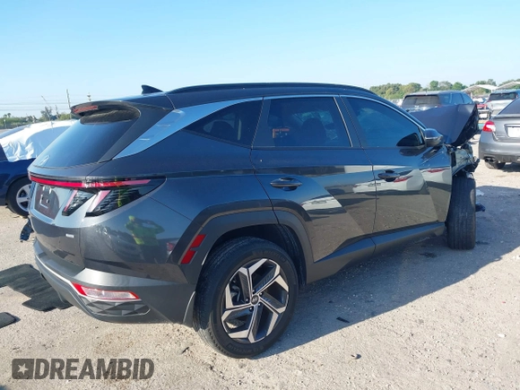 2022 Hyundai Tucson SEL with VIN 5NMJCCAE0NH138863, listed as a IAAI auction lot 41888998 with 28,734 mi miles. Bid and sale history available at carsss.com. Image 4.
