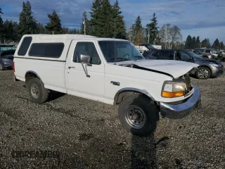 1994 Ford F-250 with VIN 1FTHF25H0RLB63173, listed as a Copart auction lot 83287804 with 85,394 mi miles and Salvage Title. Bid and sale history available at carsss.com. Image 4.