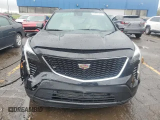 2022 Cadillac XT4 AWD Sport с VIN 1GYFZFR46NF170841, выставлен на аукционе Copart как лот 55863705 с пробегом 14 745 миль миль и Списание • Salvage title. История ставок и продаж доступна на DreamBid. Изображение 5.