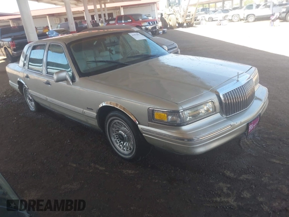 1997 Lincoln Town Car Executive z VIN 1LNLM81W6VY743706, wystawiony jako IAAI lot #41994092 z przebiegiem 265 604 mil mil oraz . Historia ofert i sprzedaży dostępna na DreamBid. Obrazek 1.