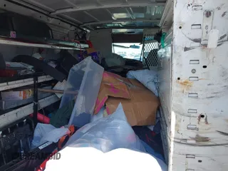 1998 Ford Econoline Cargo z VIN 1FTPE24L0WHA26141, wystawiony jako IAAI lot #42222412 z przebiegiem 345 331 mil mil oraz . Historia ofert i sprzedaży dostępna na DreamBid. Obrazek 8.
