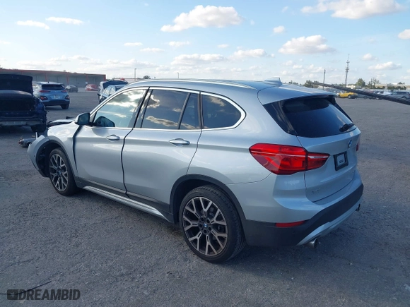 2020 BMW X1 sDrive28i with VIN WBXJG7C08L5R71214, listed as a IAAI auction lot 41514330 with 34,140 mi miles. Bid and sale history available at carsss.com. Image 3.