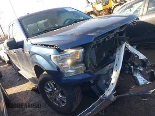 2015 Ford F-150 XLT with VIN 1FTEX1E89FKE27941, listed as a IAAI auction lot 41660854 with 89,386 mi miles. Bid and sale history available at carsss.com. Image 1.