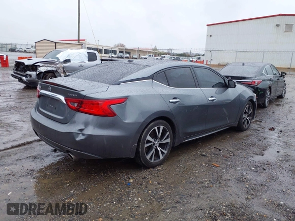 2016 Nissan Maxima SL with VIN 1N4AA6AP0GC419870, listed as a IAAI auction lot 41745259 with 128,151 mi miles and . Bid and sale history available at DreamBid. Image 4.