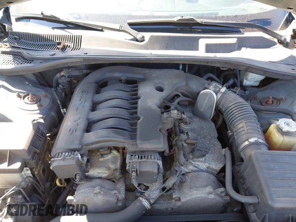 2005 Chrysler 300 with VIN 2C3JA53GX5H188833, listed as a IAAI auction lot 41906889 with 999,999 mi miles. Bid and sale history available at carsss.com. Image 10.