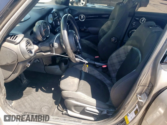 2017 MINI Hardtop 4 Door Cooper with VIN WMWXU1C53H2E18438, listed as a Copart auction lot 52871475 with 133,235 mi miles and Salvage Title. Bid and sale history available at DreamBid. Image 7.