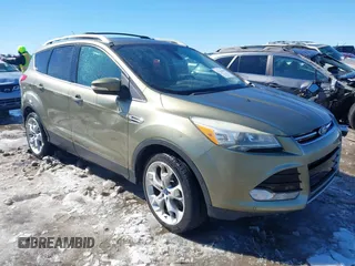 2013 Ford Escape Titanium with VIN 1FMCU9J99DUD46870, listed as a IAAI auction lot 41614409 with 141,739 mi miles and . Bid and sale history available at DreamBid. Image 1.