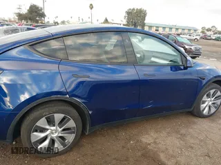 2023 Tesla Model Y Long Range with VIN 7SAYGDEE6PF947827, listed as a IAAI auction lot 41443524 with 12,381 mi miles and . Bid and sale history available at DreamBid. Image 6.