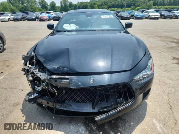 2014 Maserati Ghibli S Q4 with VIN ZAM57RTA5E1122165, listed as a Copart auction lot 60257835 with Not provided miles and Salvage title. Bid and sale history available at DreamBid. Image 5.
