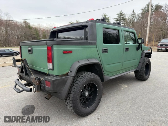 2005 Hummer H2 z VIN 5GRGN22U85107767, wystawiony jako Copart lot #56570325 z przebiegiem 197 076 mil mil oraz Tytuł czysty. Historia ofert i sprzedaży dostępna na DreamBid. Obrazek 4.