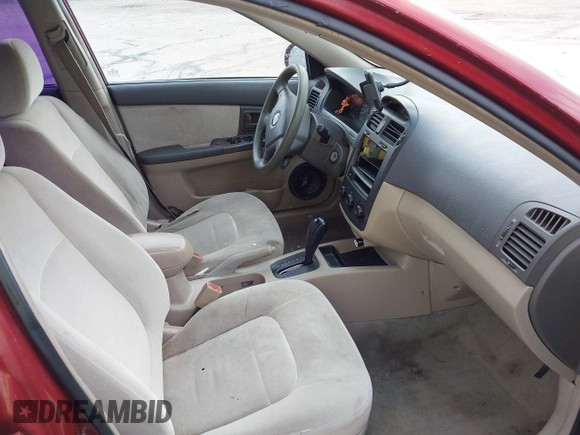 2004 Kia Spectra LX with VIN KNAFE121545021648, listed as a IAAI auction lot 41842471 with 211,436 mi miles. Bid and sale history available at carsss.com. Image 5.