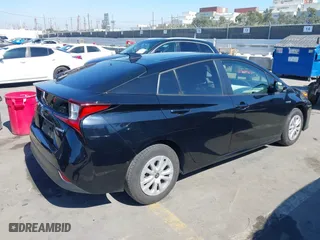 2022 Toyota Prius L Eco with VIN JTDKAMFU3N3165036, listed as a IAAI auction lot 41657575 with 44,099 mi miles. Bid and sale history available at carsss.com. Image 4.